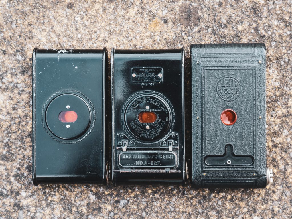 Three versions of the Vest Pocket Kodak